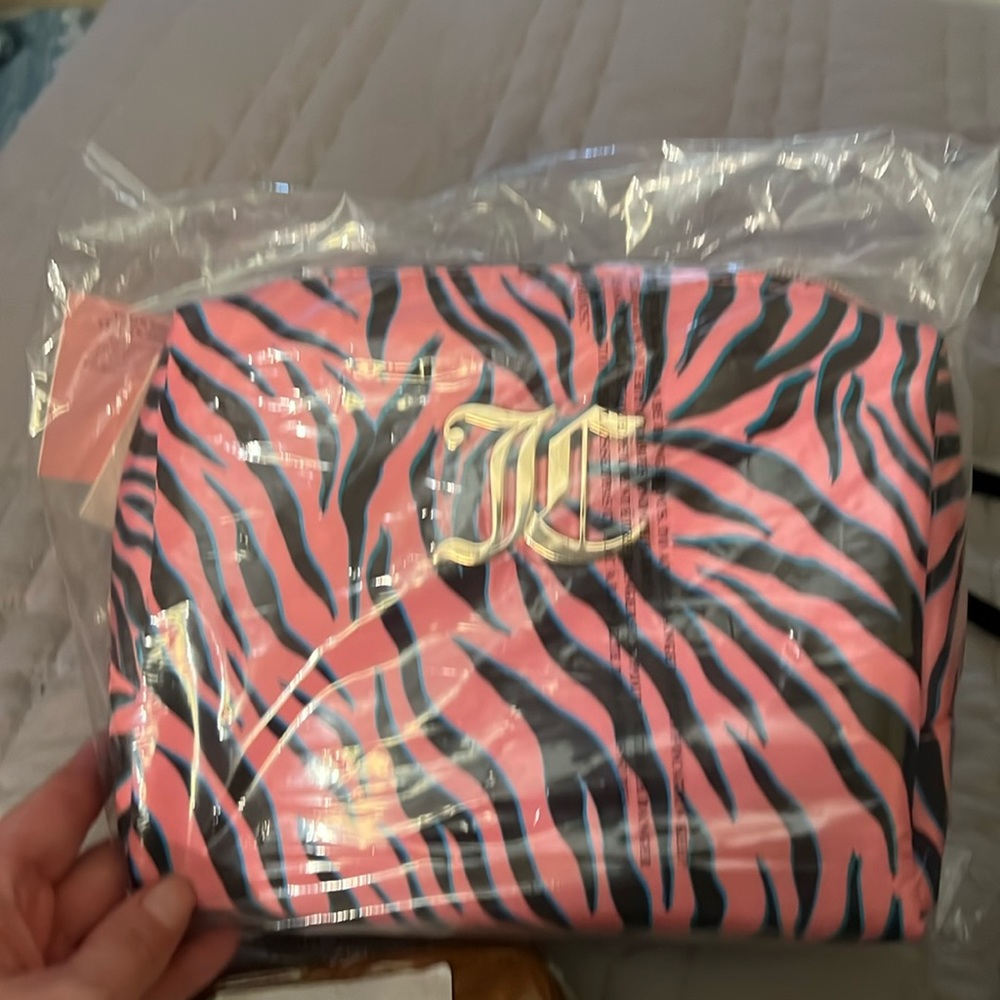 Pink and black juicy couture travel make up bag